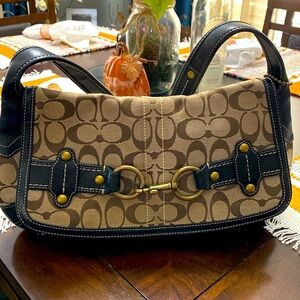 Coach vintage signature fabric with leather trim purse. Brown lettering with bei